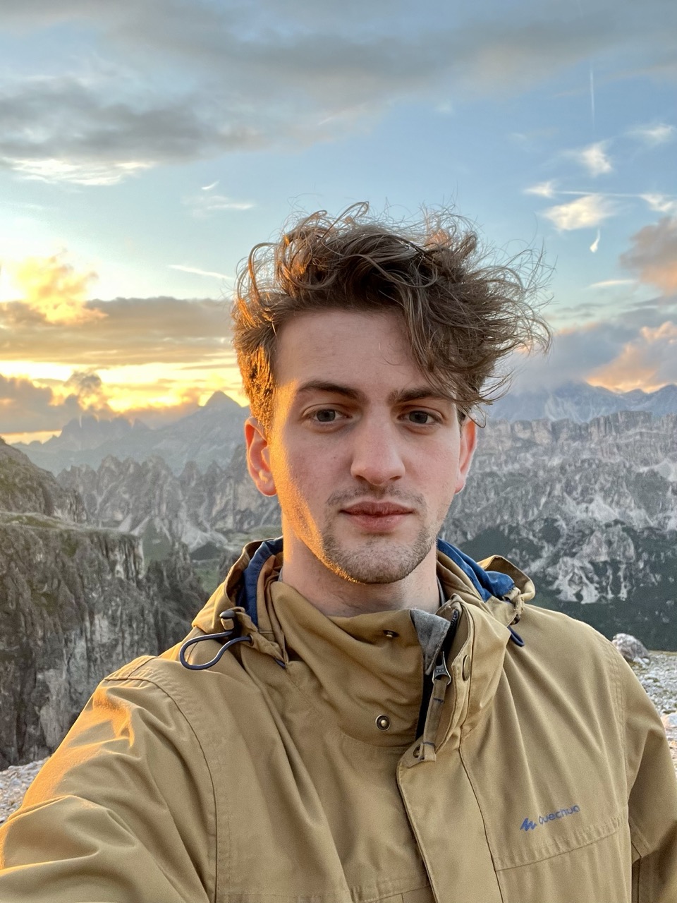 Pier Elia Benetti wearing a yellow jacket in the mountains